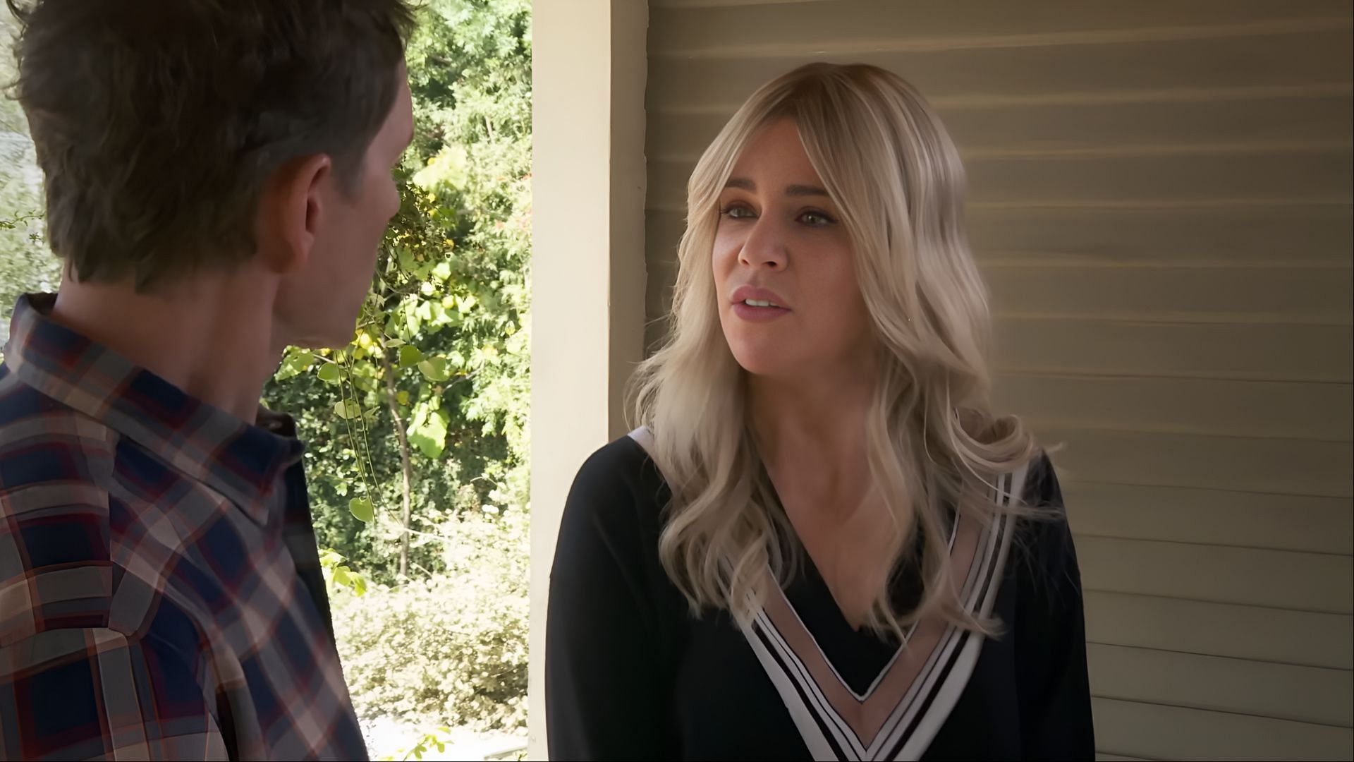 Kaitlin Olson as Dee Reynolds in It's Always Sunny in Philadelphia season 17, seen confronting Dennis in a porch scene. (Image via FX Networks)